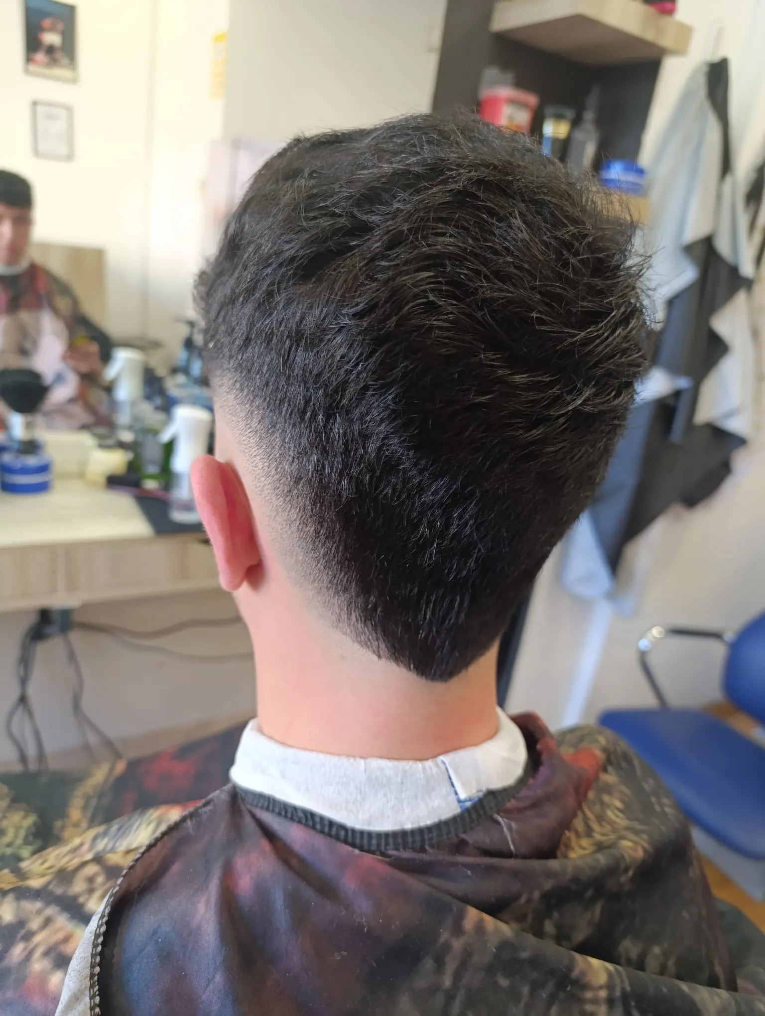 Corte degradado en Norden Barber Cuenca
